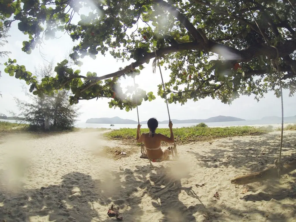 short getaway in Malaysia, tropical beach, swing, tree