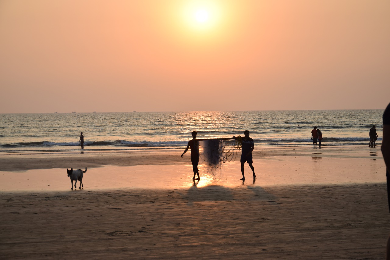 hidden gems in Goa, beach, golden hour, people at the beach, 