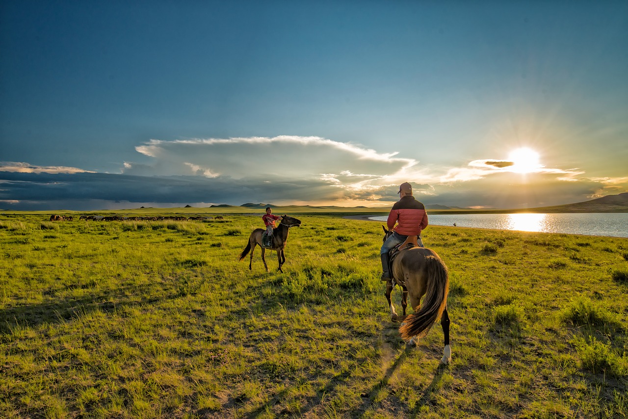 famous landmarks in Mongolia, horses, lake, fields, Mongols, nomads