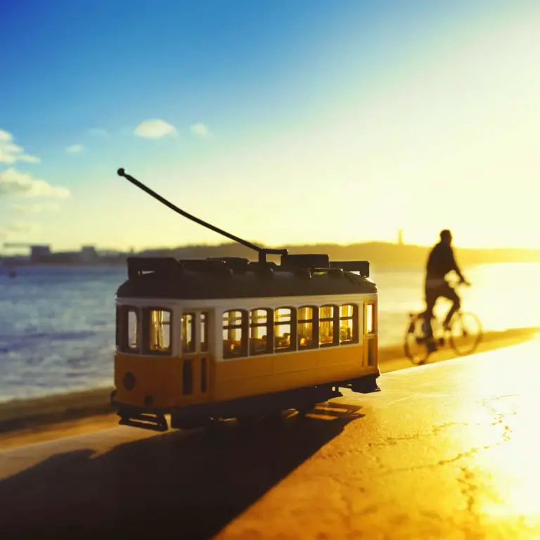 1 day in Lisbon, man cycling, tram, sunset