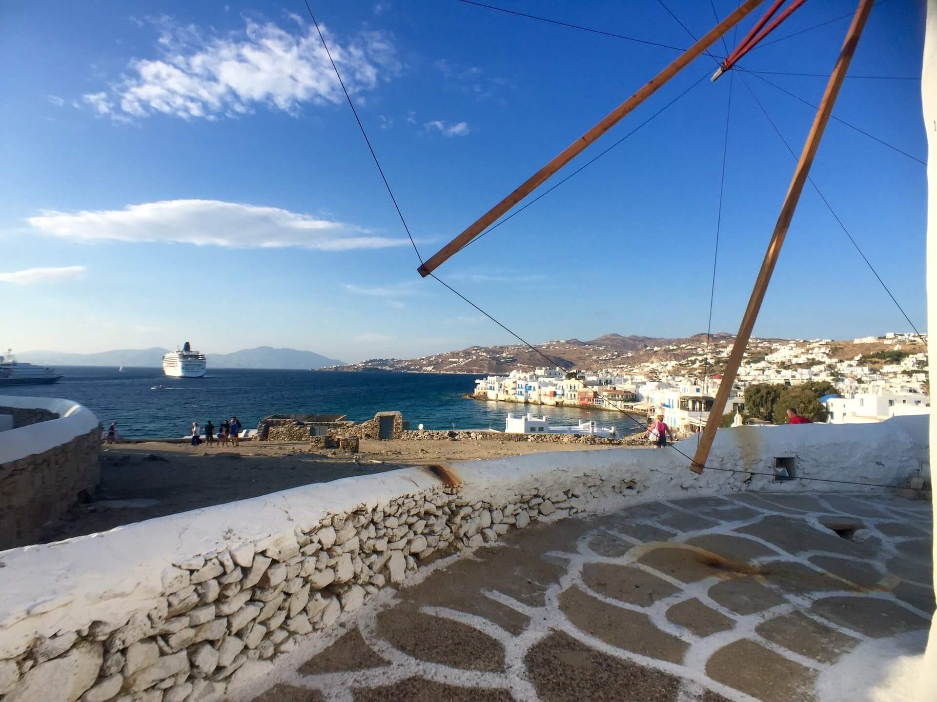 1 day in Mykonos, windmill with a view of a cruise ship on the Aegean sea, Mykonos, Greece
