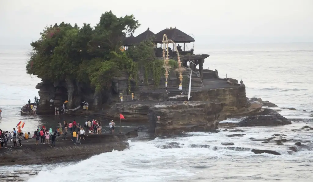 7 days in Bali itinerary, Tanah Lot just before sunset, ancient temple in Bali on rocky outcrop, Bali, Indonesia