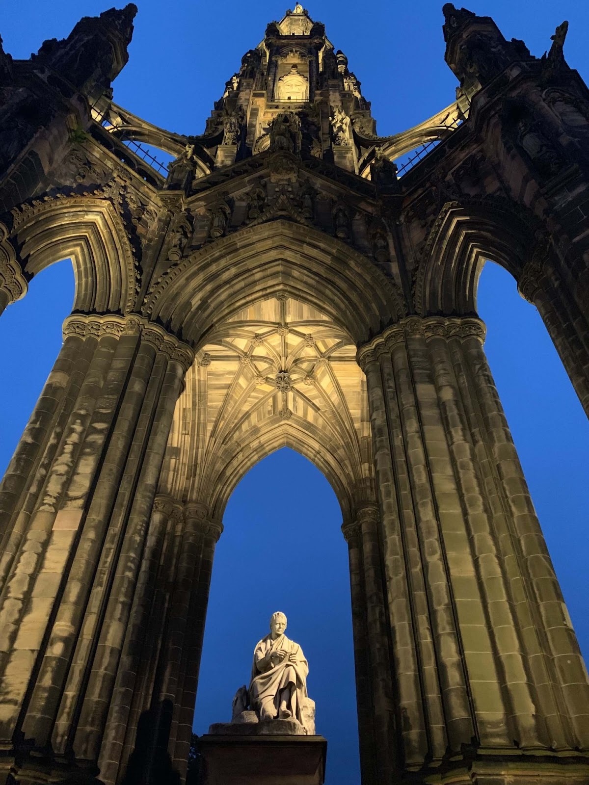 24 hours in Edinburgh. This is a bottom-up image of the Scott Monument with a view of Sir Walter Scott's statue.