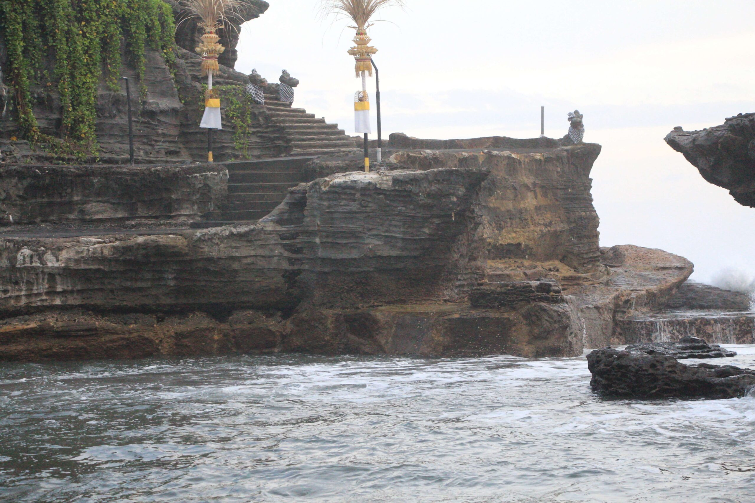 Bali breakup curse. This is an image of the stairs leading to the Tanah Lot temple. This was taken just before sunset during high tide.